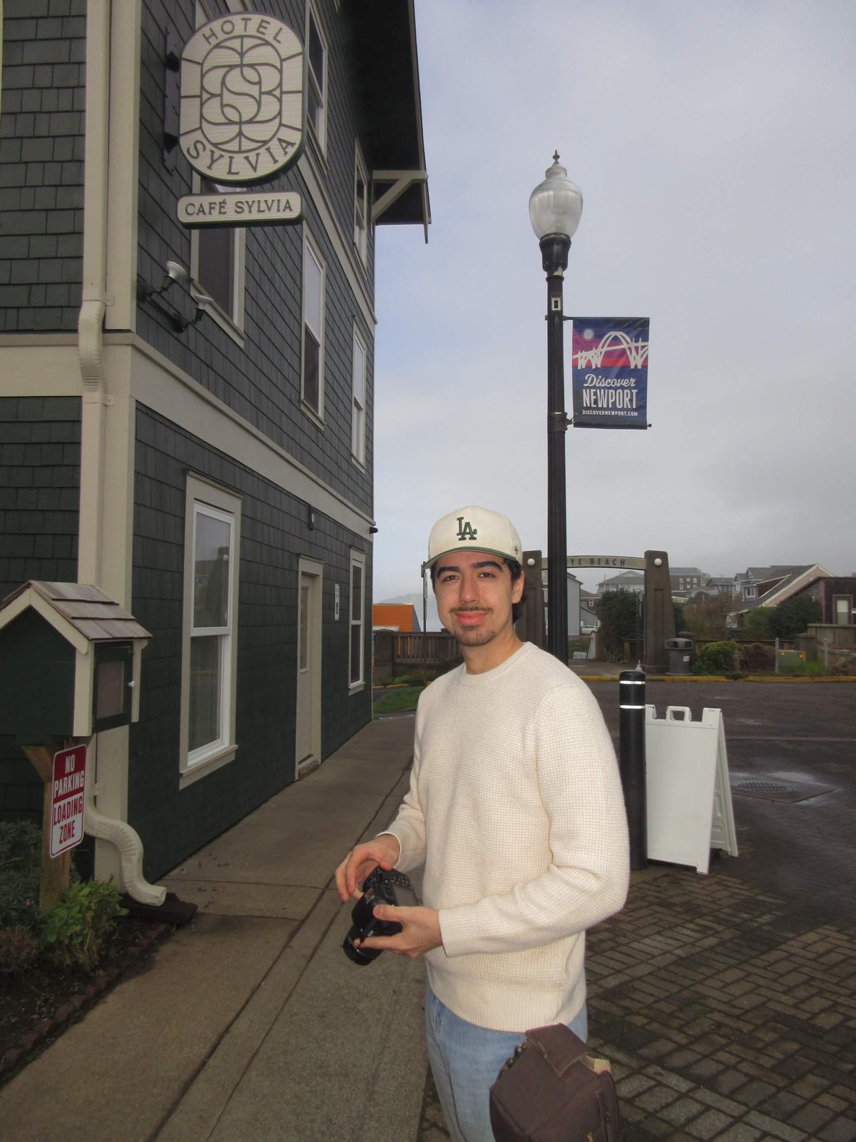 Adell Al-Matrood with a camera in Newport, Oregon